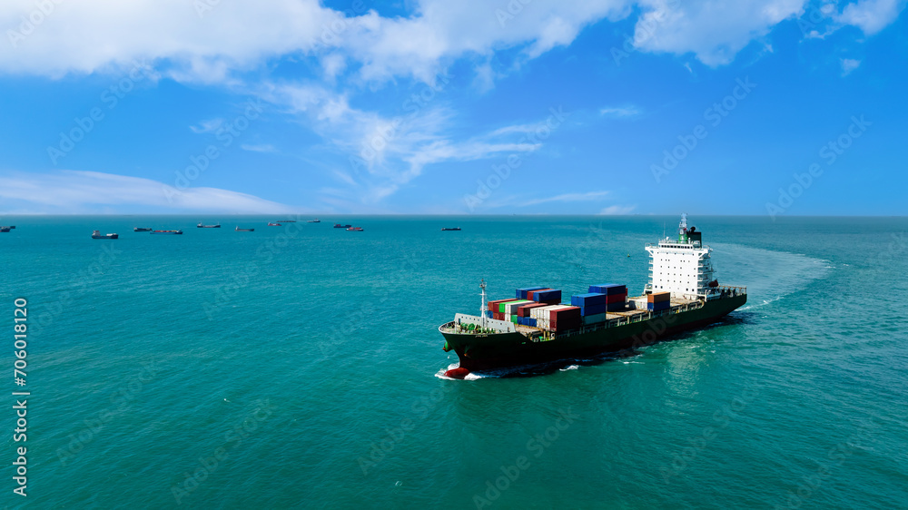 logistic cargo container ship sailing in sea to import export goods and distributing products to dealer and consumers across worldwide, aerial front view logistic cargo container ship sailing in sea to import export goods and distributing products to dealer and consumers across worldwide, aerial front view