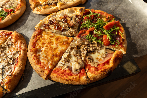 Various types of delicious pizza, top view