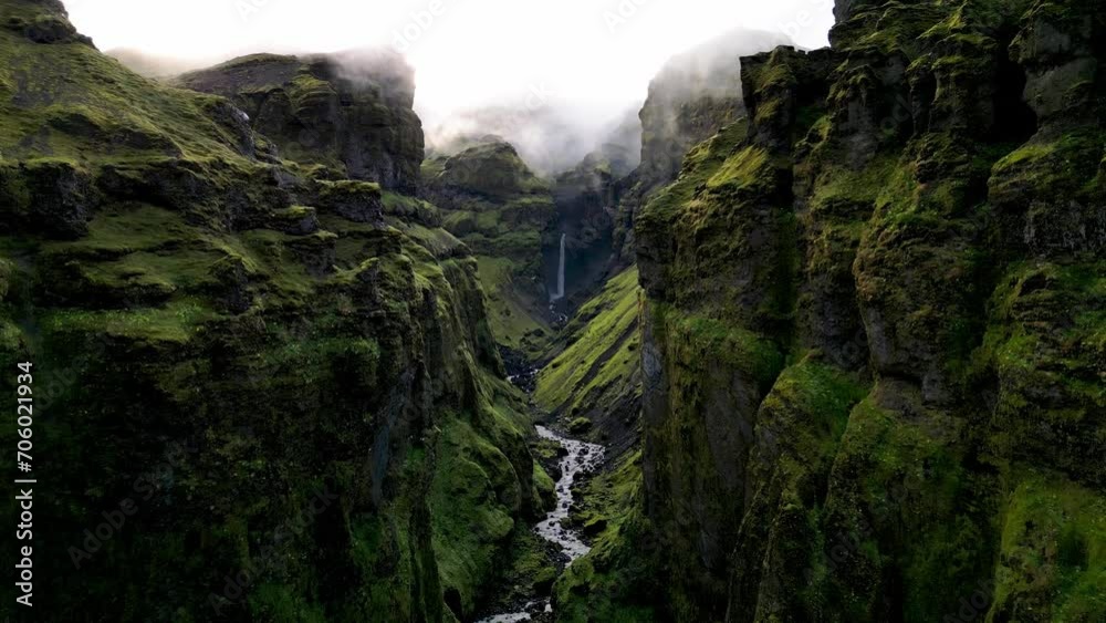 Mulagljufur Canyon with Hangandifoss Waterfall , Iceland. travel destination.landscape footage