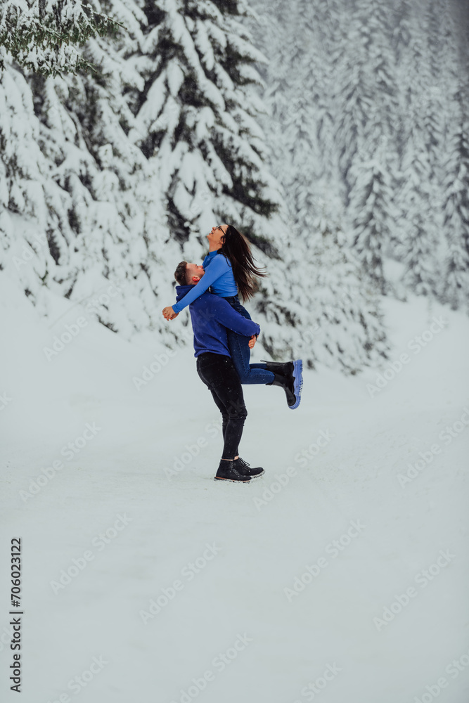 On a snowy Valentine's Day, this romantic couple shares warmth, laughter, and tender embraces, creating a blissful winter love story. On a snowy Valentine's Day, this romantic couple shares warmth, laughter, and tender embraces, creating a blissful winter love story.