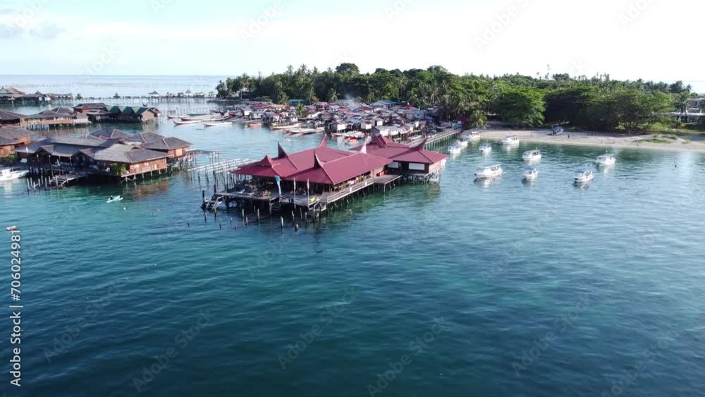 Drone view of Mabul Island, the base for diving in Sipadan Island, Sabah state in Malaysia. Drone view of Mabul Island, the base for diving in Sipadan Island, Sabah state in Malaysia.