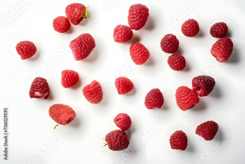 close up lay flat of raspberries on a white work surface , flat lay top view shot from above even aylight lighting, strong focus good detail photo realistic,