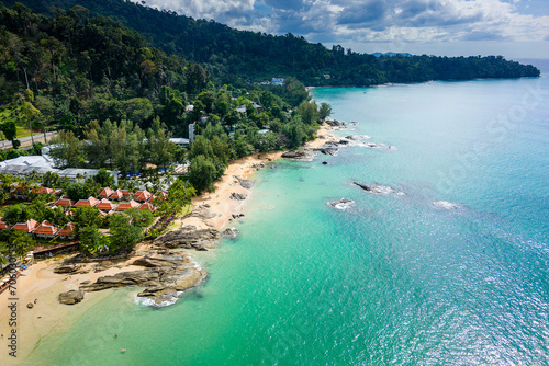 Aerial view of hotels and resorts next to the tropical Nangthong Beach in Khao Lak, Thailand photo