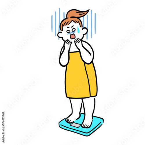 体重計に乗ってショックを受けている太り気味の女性