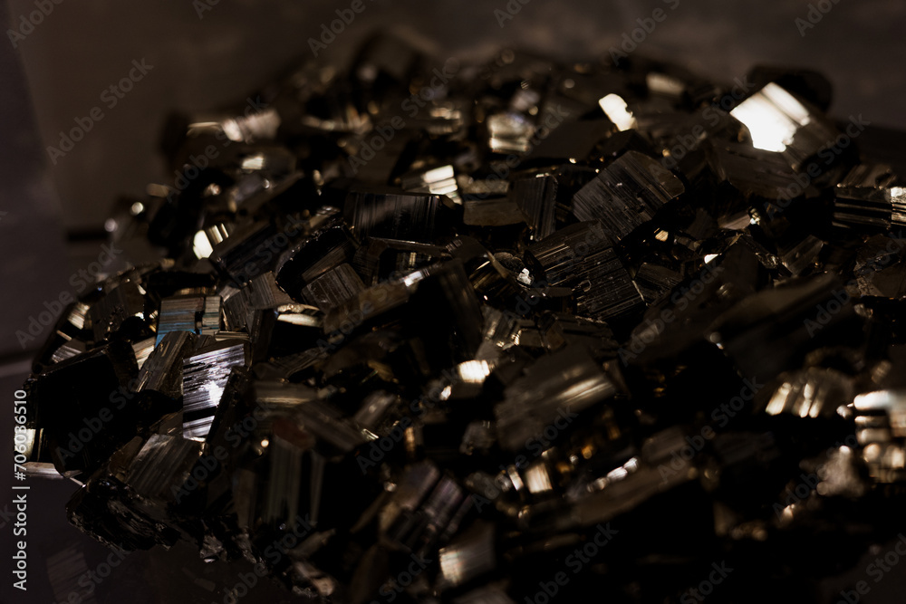 Black cystal shinging under spotlight Black cystal shinging under spotlight