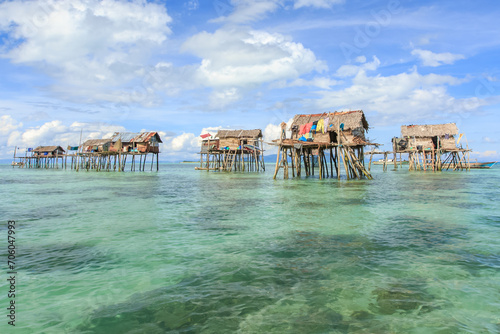 Beautiful landscapes view borneo sea gypsy water village in Bodgaya Mabul Island, Semporna Sabah, Malaysia. photo