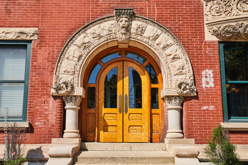 Ornate Victorian Doorway and Stone Arch, Red Brick Frame
