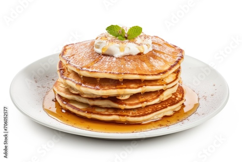 stack of pancakes with syrup on a white plate 