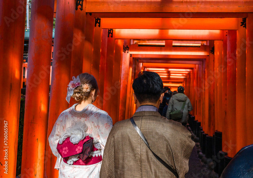 Tourists visiting the Fushimi Inari Taisha shrine in Kyoto, Japan.