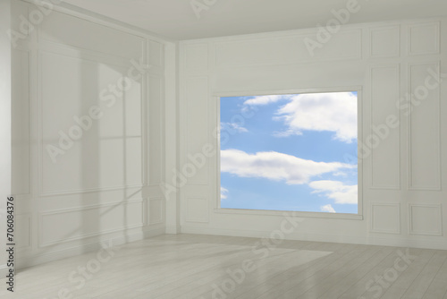 Empty room with white walls and large window © New Africa