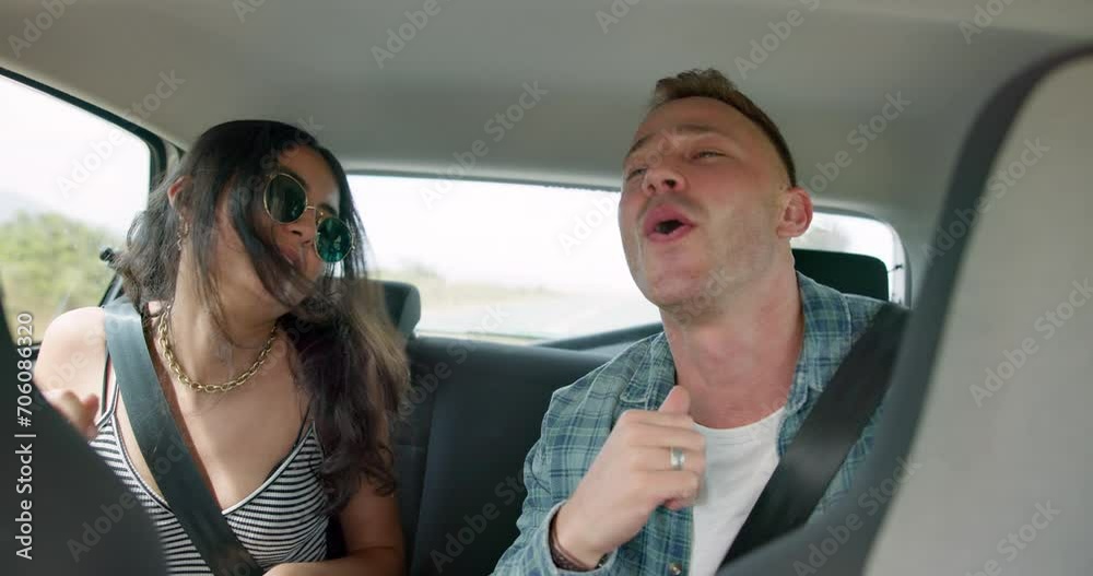Happy people, dance and sing in car for road trip, travel or adventure in transportation. Excited man and woman or friends smile enjoying bonding, holiday or weekend vacation in vehicle together