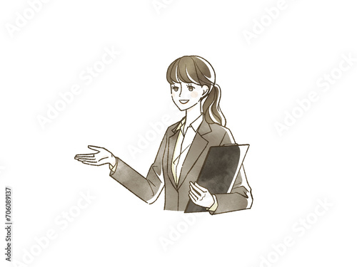 笑顔のスーツ姿の女性