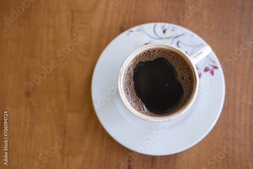 a cup of turkish coffee on table 