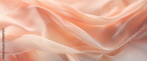 Pale peach silk blending seamlessly into a soft and ethereal abstract background