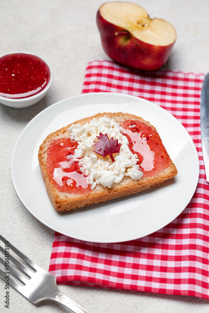 Table setting with tasty toast on white background, closeup. Canadian flag concept Table setting with tasty toast on white background, closeup. Canadian flag concept