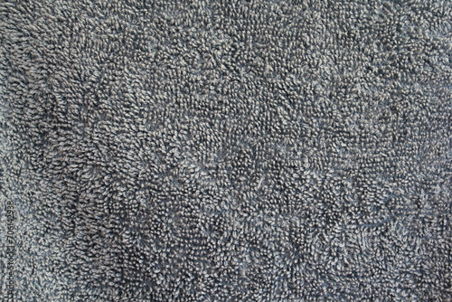 Close up textured background of grey gray fabric cloth