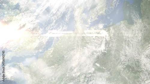 Zoom in from space and focus on Espelkamp, Germany. 3D Animation. Background for travel intro. Elements of this image furnished by NASA. photo