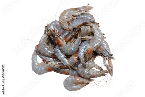 Fresh shrimp tails isolated. Raw headless prawn, pacific shrimp, uncooked tiger prawns, jumbo seafood on white plate on isolated background  photo