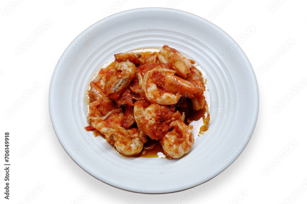 Schezwan Prawns in white plate with wooden background. Schezwan Prawns is indo-chinese cuisine curry dish with prawns or shrimps roasted in Schezwan Sauce. Udang saos Padang Schezwan Prawns in white plate with wooden background. Schezwan Prawns is indo-chinese cuisine curry dish with prawns or shrimps roasted in Schezwan Sauce. Udang saos Padang