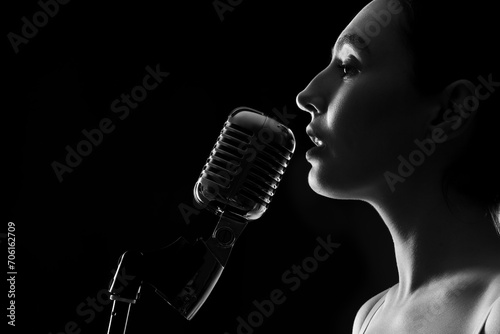 Silhouette of female singer...