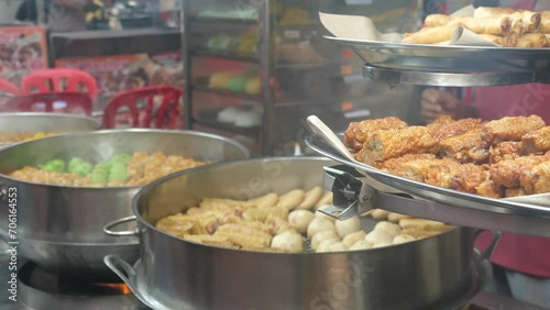 A colorful feast for the senses on Jalan Alor's food-filled street