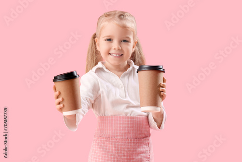 Cute little barista with co...