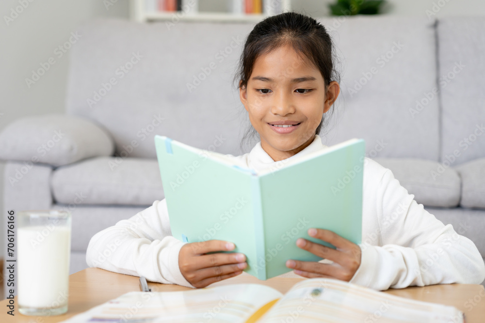 girl learn at home. Do homework, encourage for exam. Asia girl happy Homeschool, education, Practice, tech book, study, child, course for Asian children. girl learn at home. Do homework, encourage for exam. Asia girl happy Homeschool, education, Practice, tech book, study, child, course for Asian children.