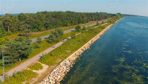 Cycling on the biking lane near the baltic sea towards Chalupy, Poland photo