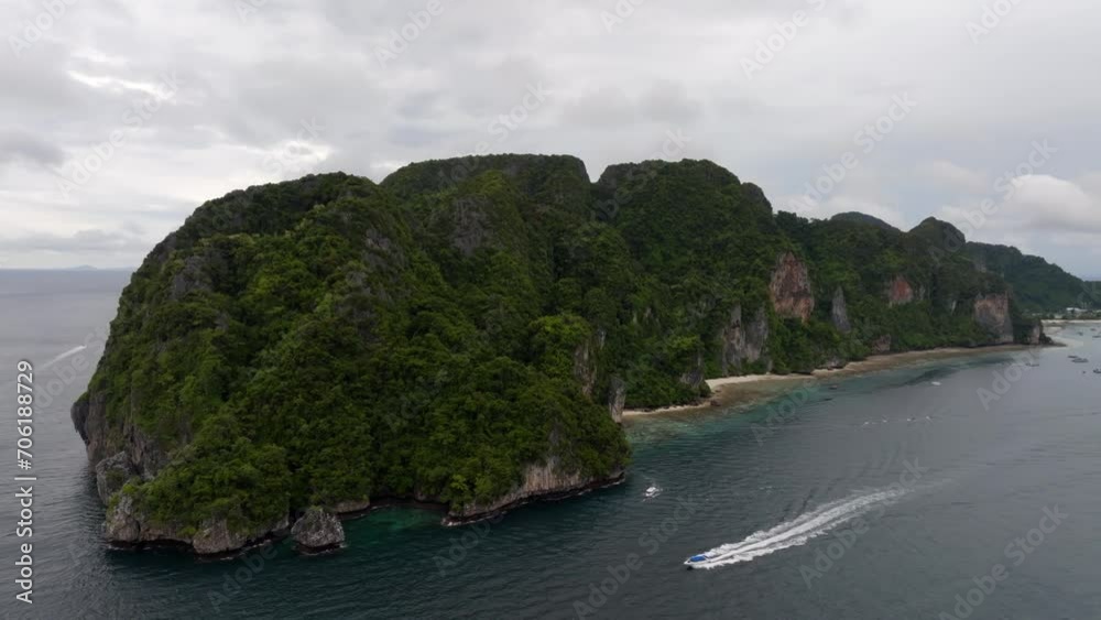 Drone footage from PhiPhi islands in Thailand footage of incredible Thai landscapes incredible nature with insane rocks, beaches, hills, ocean adn boats. Footage. filmed in 4k