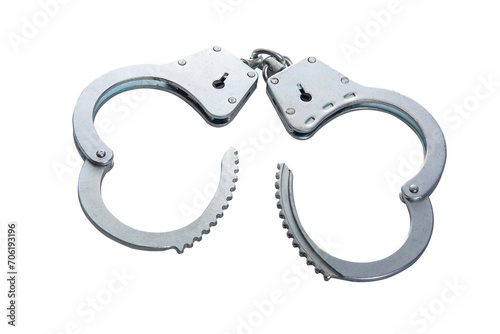 Metal handcuffs on a white isolated background, copy space photo