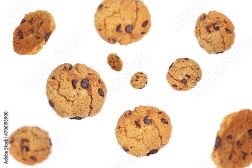 Delicious chocolate chip cookies falling on transparent background png © Nofi