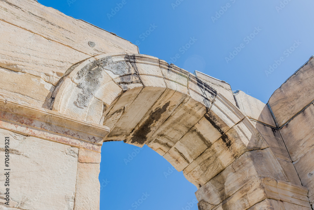 Fototapeta premium Low angle of arch in wall at archeological site.