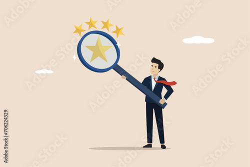 Appraisal, analyze employee performance concept, evaluate or assessment for quality or value, businessman with magnifying glass with stars quality score.