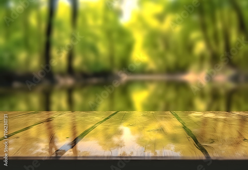 empty wooden table with blurry forest river background
