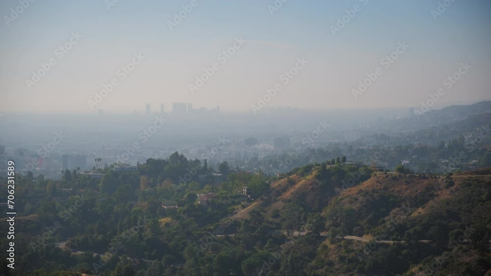 View of Los Angeles downtown and hills, California on sunny day View of Los Angeles downtown and hills, California on sunny day