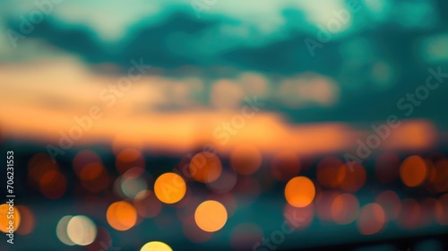  a blurry photo of a city at night with a lot of lights in the foreground and a blurry sky in the background. © Shanti