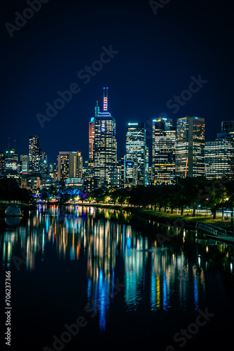 Illuminated downtown city buildings at night in Melbourne  Australia.