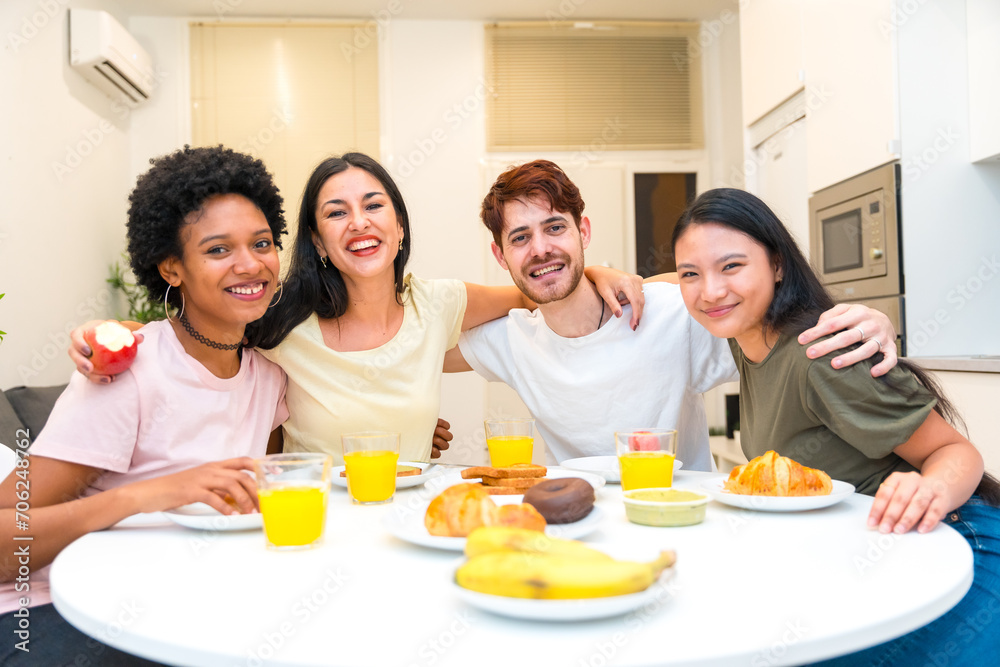 Portrait of multi-ethnic friends sitting on a breakfast table Portrait of multi-ethnic friends sitting on a breakfast table