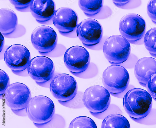 Purple stone balls arrangement with a white background