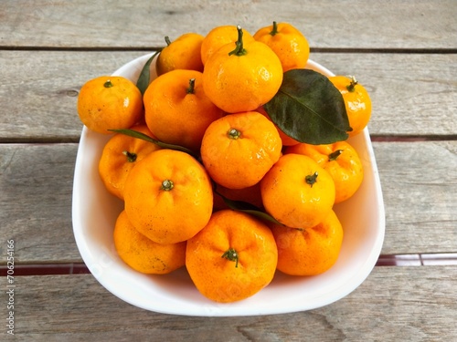 Santang oranges or small mandarin oranges are a type of orange that originated in China. They are small and have a sweet taste and fragrant aroma. Usually served for Chinese New Year.