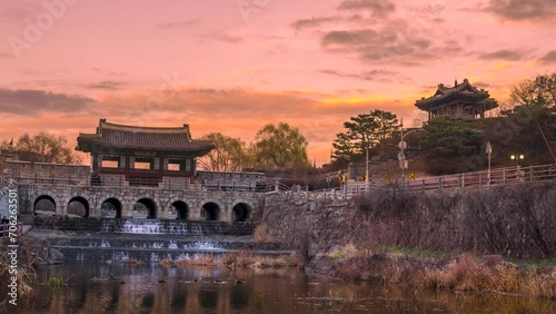 Time lapse, Banghwasuryujeong and Dongbukru in Hwaseong, Suwon with a beautiful sunset. Zoom in