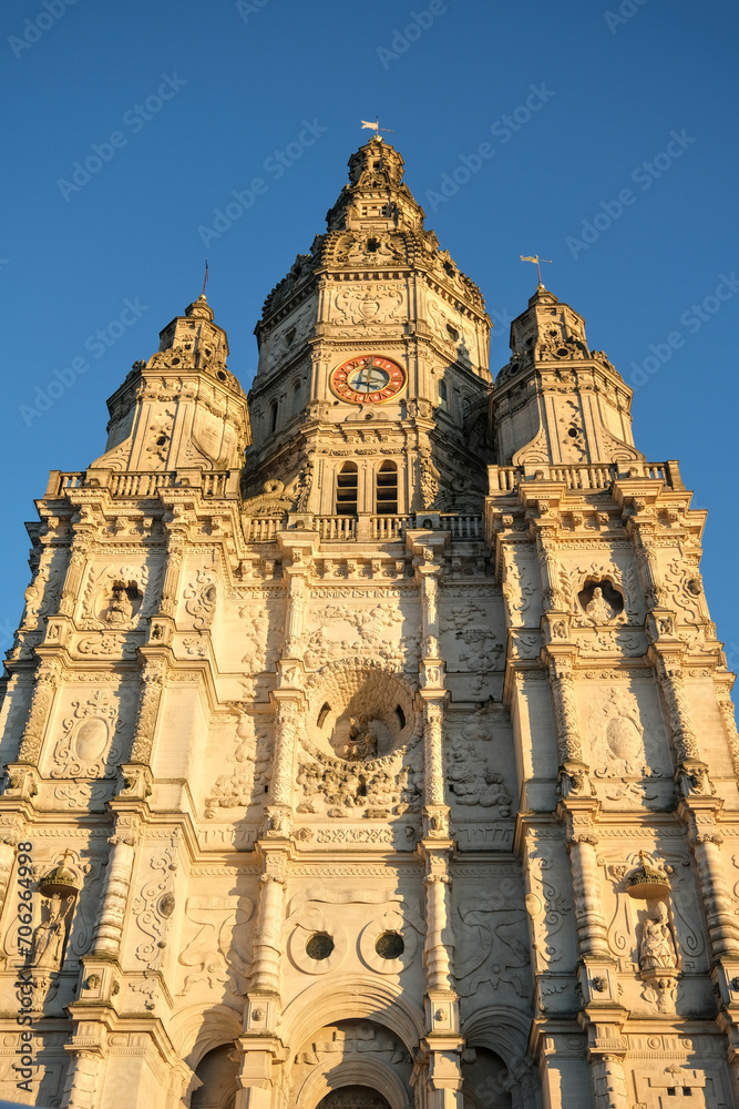 Low angle view of Abbey tower of Saint Amand les Eaux, on main square, at sundown.
