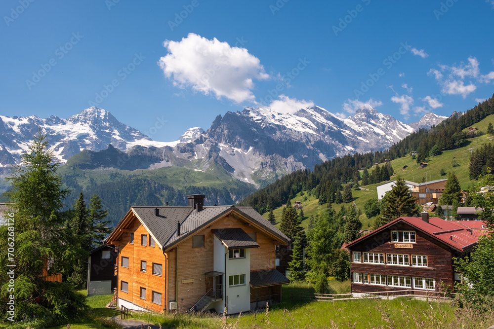 Summer serenity in Gimmelwald, Switzerland. A mesmerizing view of the Bernese Alps from this charming Oberland village