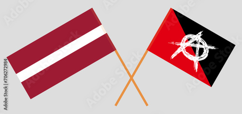 Crossed flags of Latvia and anarchy. Official colors. Correct proportion