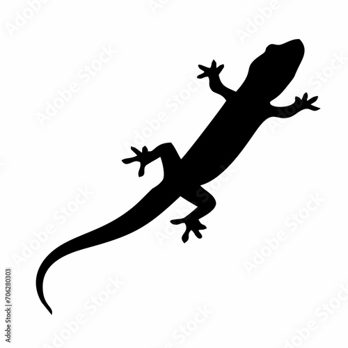 Fényképezés silhouette of a black lizard crawling