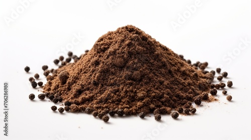 arrangement of an isolated pile of ground black pepper on a clean white canvas, showcasing the finely milled texture and bold flavor of this classic spice.