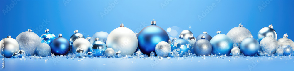 Group of Blue and Silver Ornaments on Blue Background Group of Blue and Silver Ornaments on Blue Background