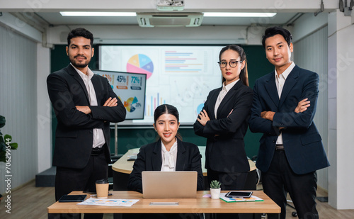 Asian business people team analyzing statistics financial. Team of businesspeople Meeting Conference Discussion Corporate Concept in office.