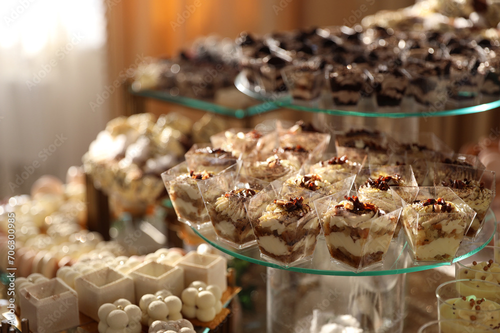 Different types of sweet desserts,mousses,biscuits.Candy bar mock up.Soft focus