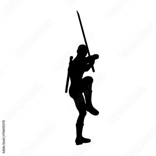 Silhouette of a male warrior in action pose with sword weapon. Silhouette of a man fighter carrying sword weapon.